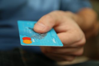 Image of credit card in a hand