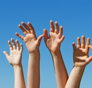 Image of Hands Raised in the Air